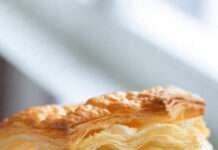 Paneer Puff Madness: The Flaky Snack That Took Over My Weekend flaky puff pastry in focus, melty paneer peeking ou